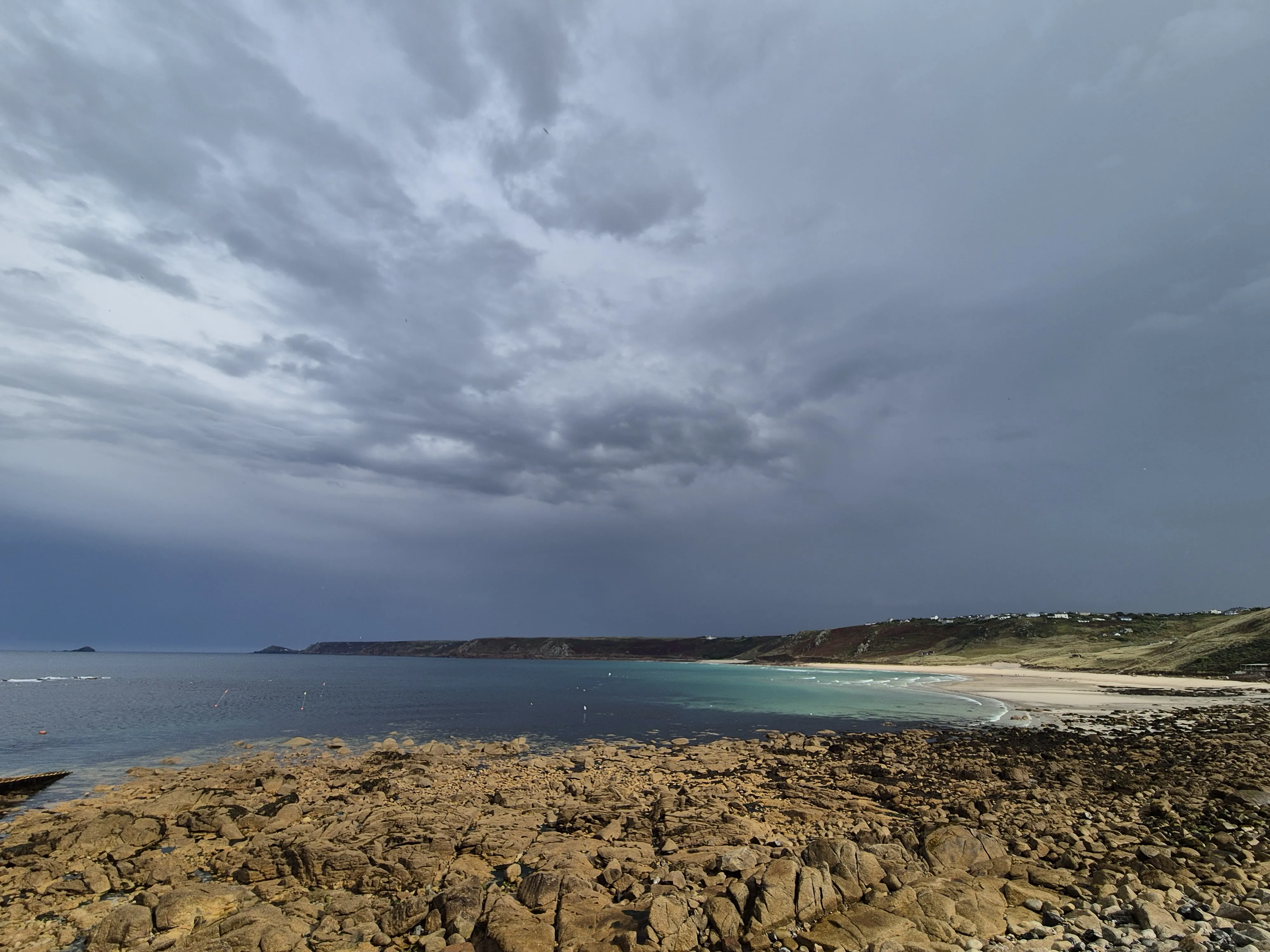 Sennan Cove view with grey sky.